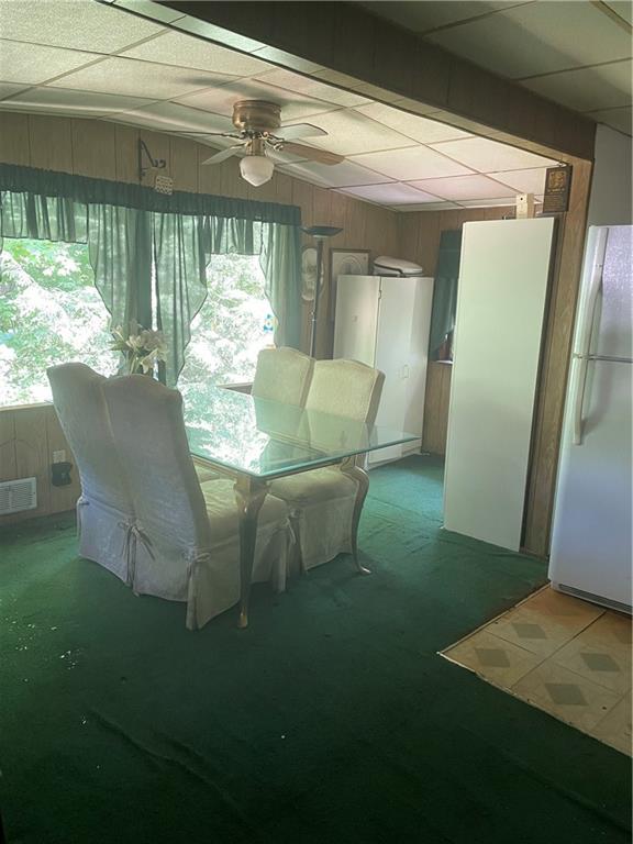 106 Graham Road Slippery Rock, PA 16057 - Photo 2 of 5 a dining room with furniture and a window