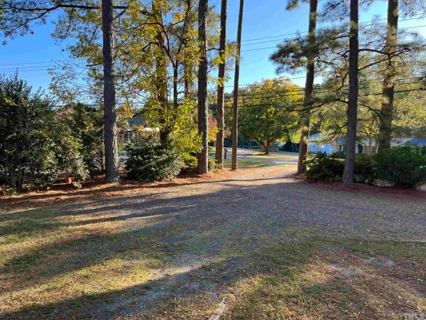 a view of road with trees