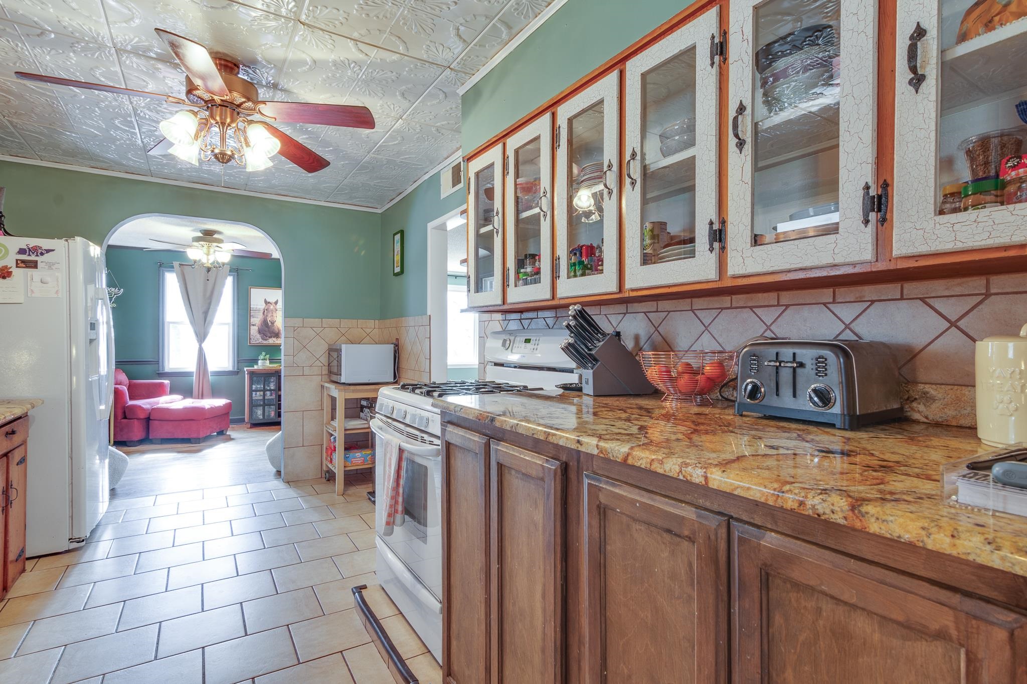 4019 Fonta Road Bartlett, TN 38135 - Photo 1 of 39 a kitchen with a stove a sink and a cabinets