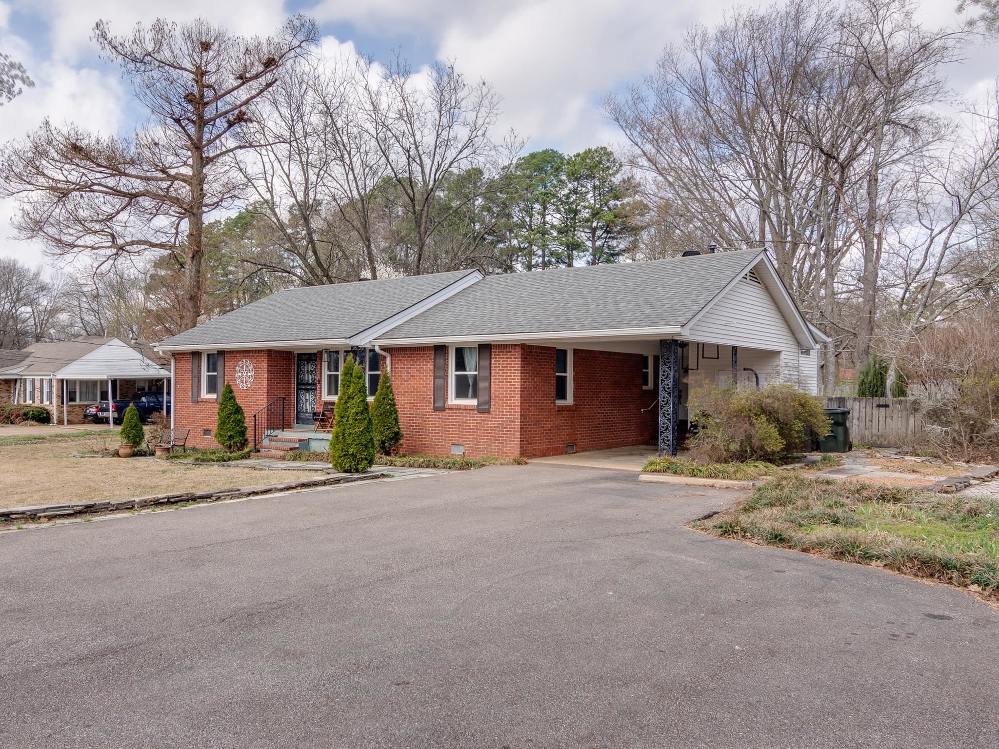 4019 Fonta Road Bartlett, TN 38135 - Photo 18 of 39 a front view of a house with a garden and tree