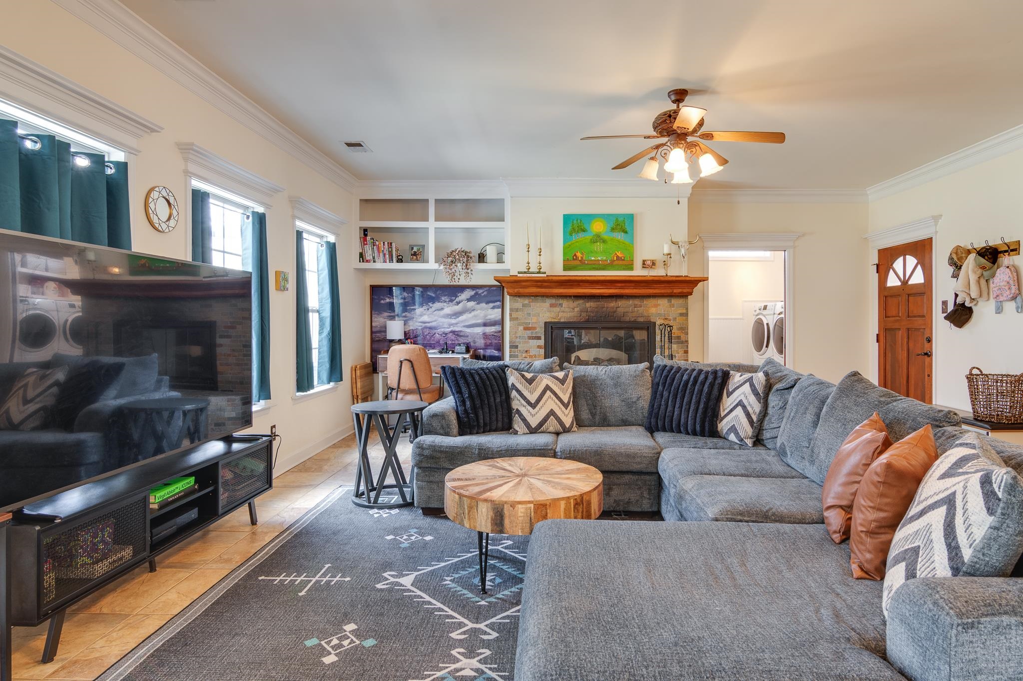 4019 Fonta Road Bartlett, TN 38135 - Photo 26 of 39 a living room with furniture a fireplace and a flat screen tv