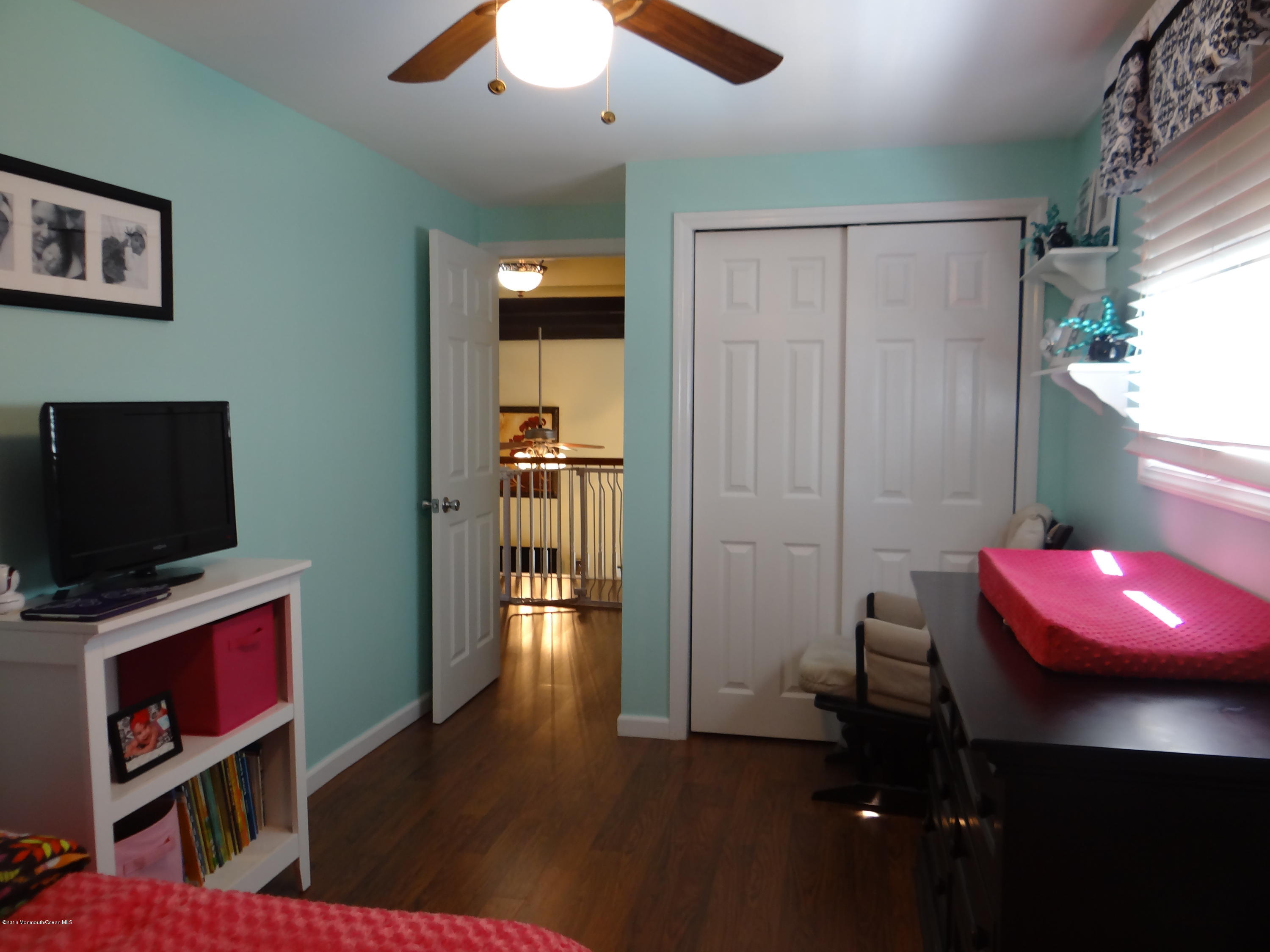 13 Valley Road Manalapan, NJ 07726 - Photo 18 of 26 a view of a workspace with furniture and natural light