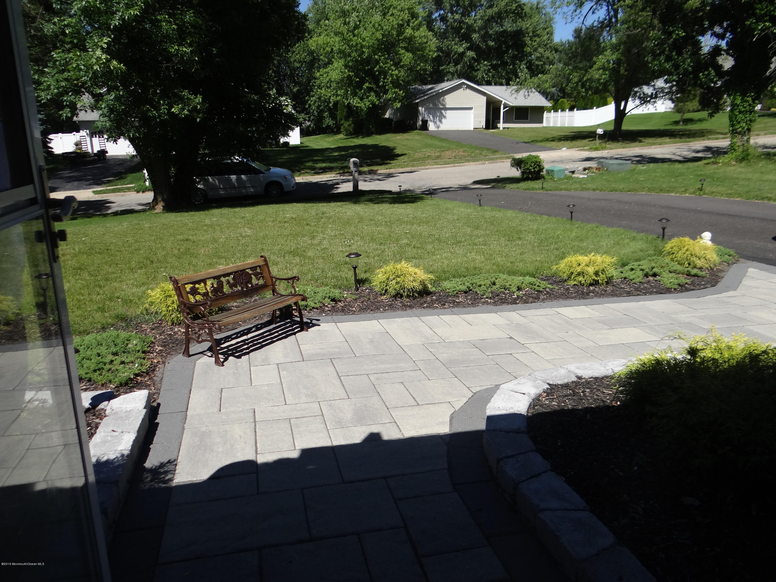 13 Valley Road Manalapan, NJ 07726 - Photo 3 of 26 a view of yard with outdoor seating and green space