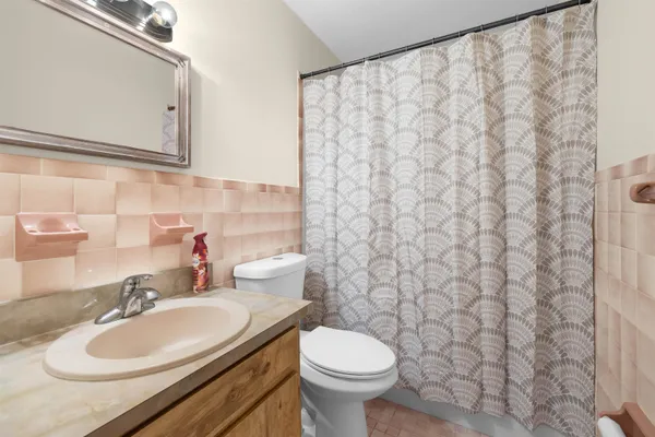a bathroom with a sink and a toilet