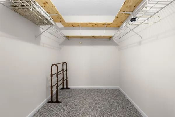 a view of a room with racks on the wall