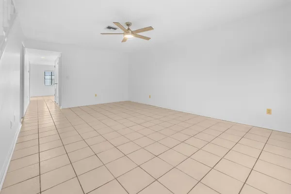 a view of a room with white walls