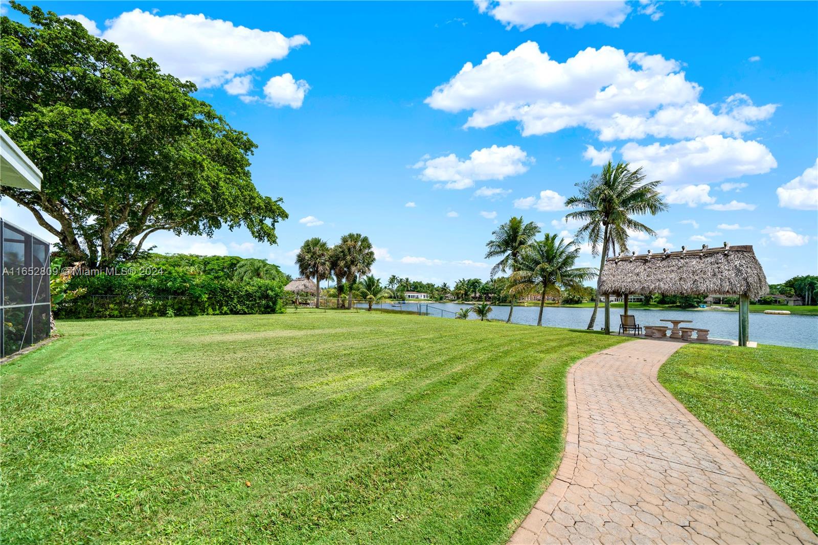 10962 Southwest 117th Street Miami, FL 33176 - Photo 12 of 42 a view of a golf course with a fountain