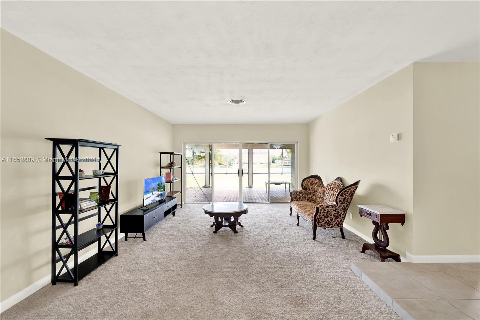 10962 Southwest 117th Street Miami, FL 33176 - Photo 21 of 42 a reading room with furniture and a window