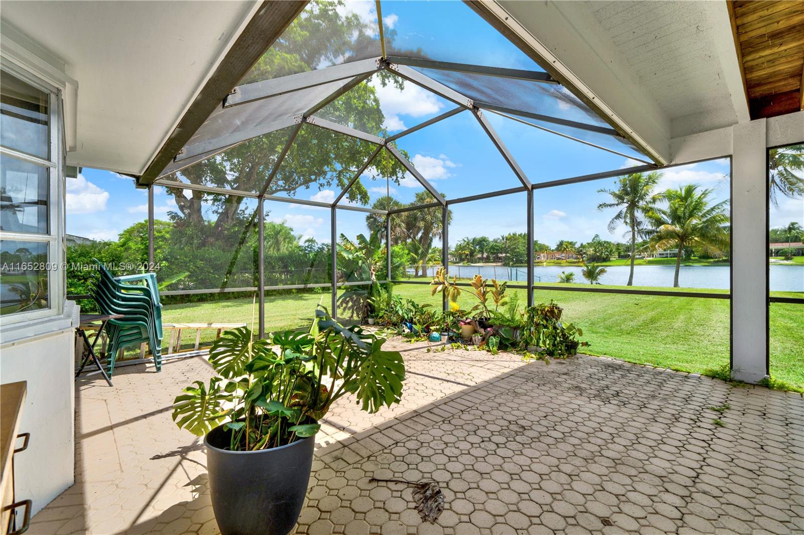10962 Southwest 117th Street Miami, FL 33176 - Photo 34 of 42 a garden view with a seating space