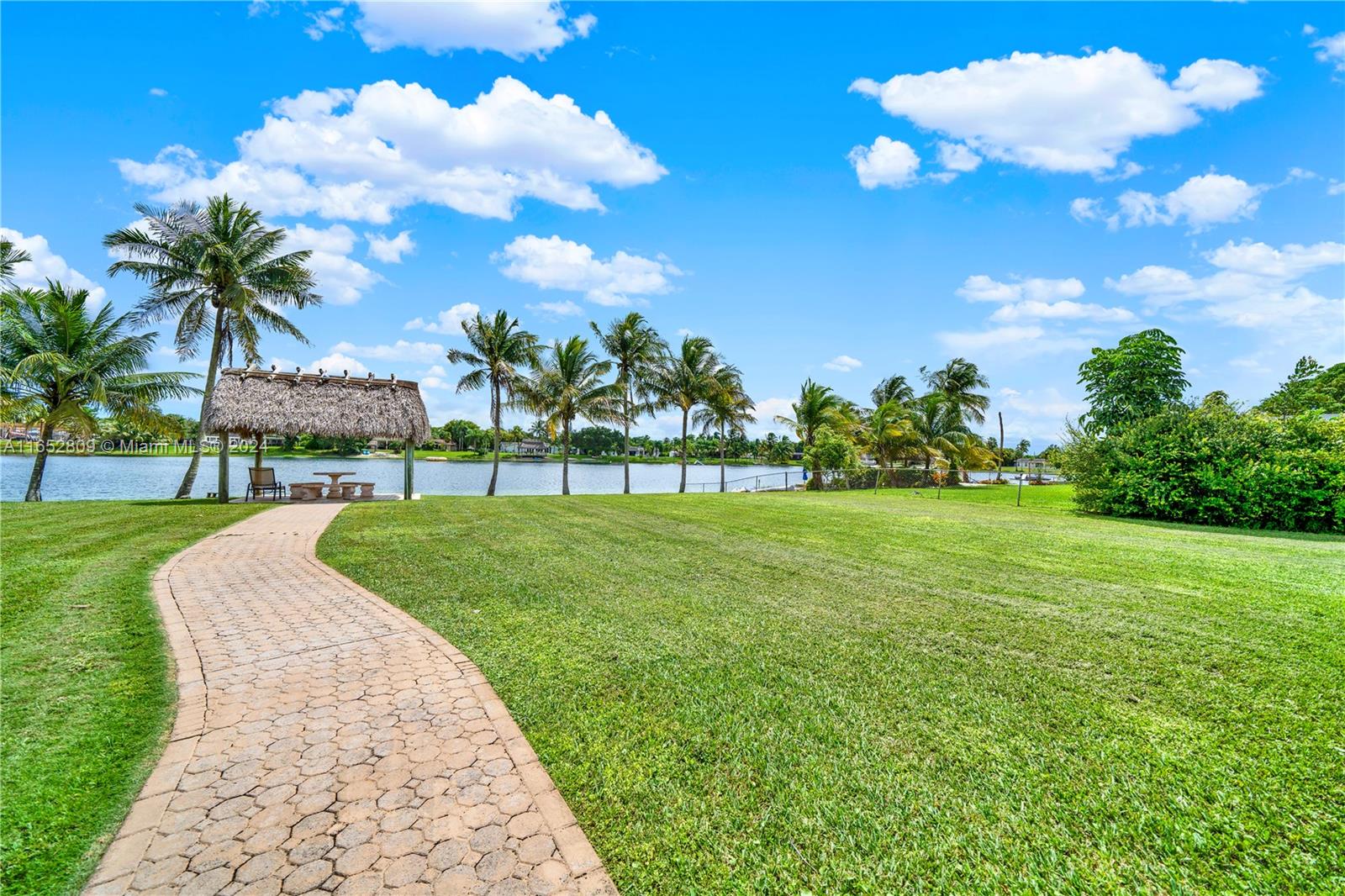 10962 Southwest 117th Street Miami, FL 33176 - Photo 39 of 42 a view of a garden with an apartment