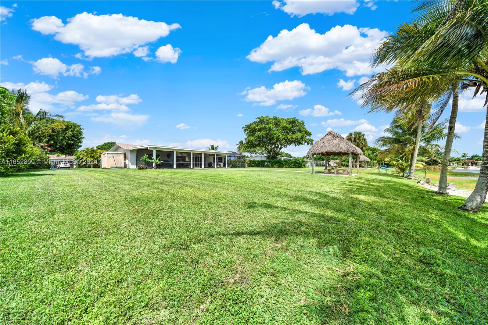 10962 Southwest 117th Street Miami, FL 33176 - Photo 41 of 42 a view of a house with a big yard