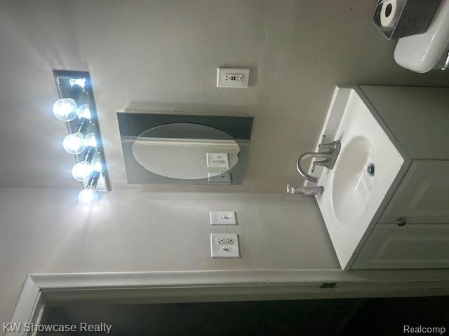 24845 Ridgecroft Avenue Eastpointe, MI 48021 - Photo 4 of 5 Half bath featuring vanity and toilet