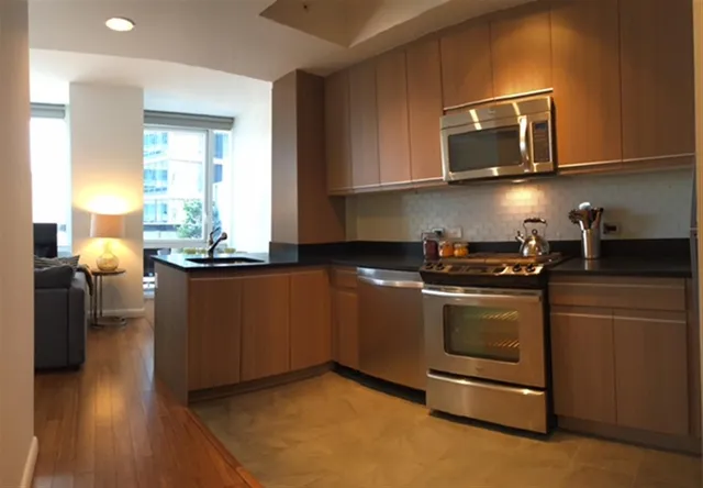 a view of a dining room with furniture and window