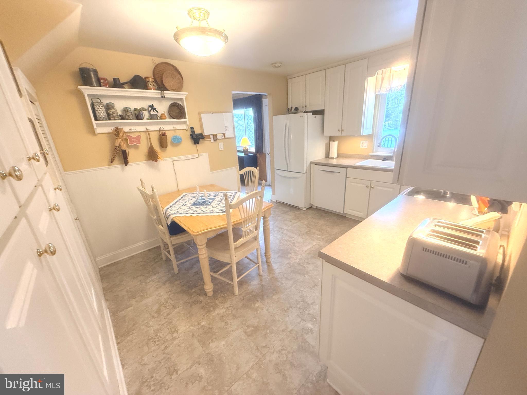 2343 Hancock Drive Lancaster, PA 17601 - Photo 15 of 41 a kitchen with stainless steel appliances kitchen island granite countertop a sink and a white cabinets