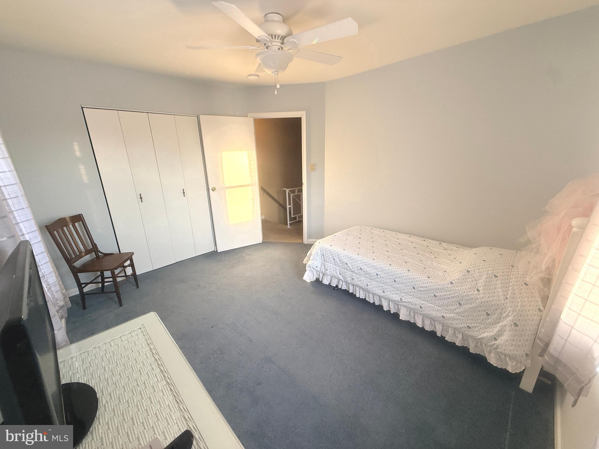 2343 Hancock Drive Lancaster, PA 17601 - Photo 22 of 41 a spacious bedroom with a bed and a chair