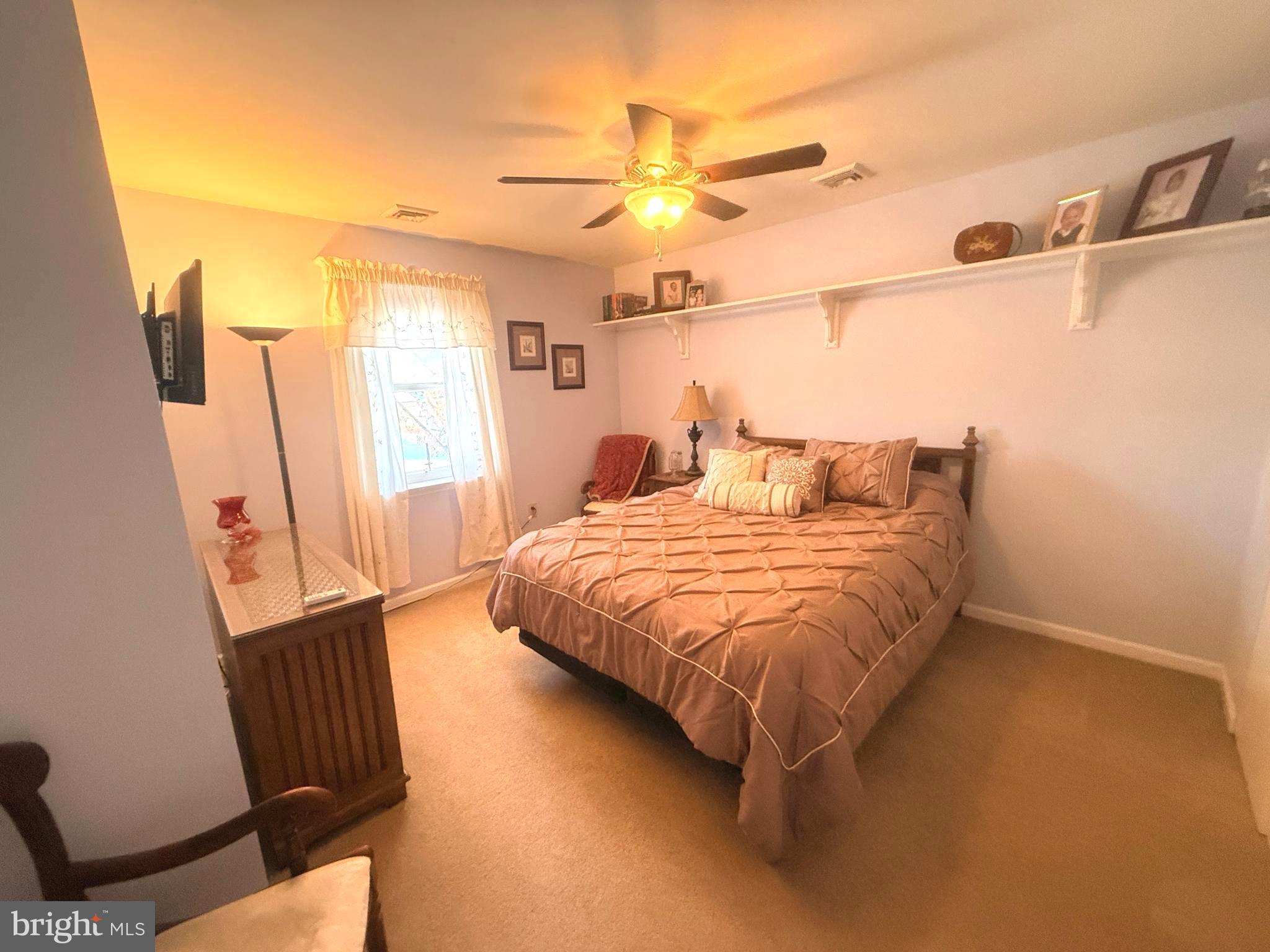 2343 Hancock Drive Lancaster, PA 17601 - Photo 23 of 41 a bedroom with a bed and wooden floor
