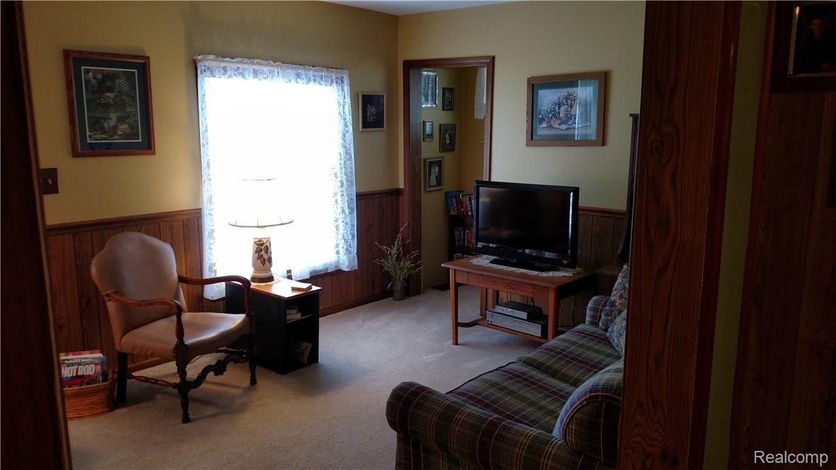 8570 Brown Road Avoca, MI 48006 - Photo 9 of 29 This is another view of the living room.