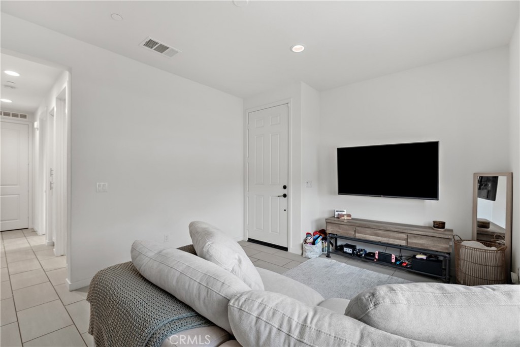 28341 Heather Grn Way Menifee, CA 92584 - Photo 27 of 44 Living room and Casita showing a private exit door