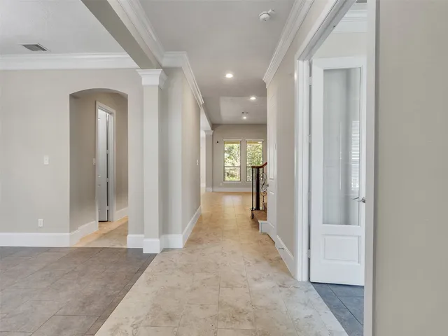 wooden floor with a bathroom
