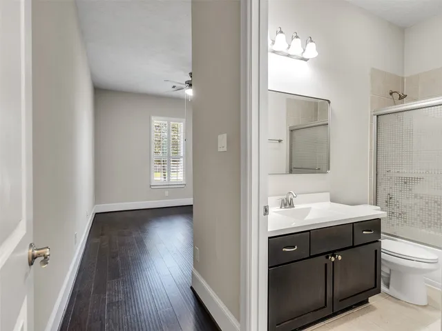 a view of a hallway with stairs