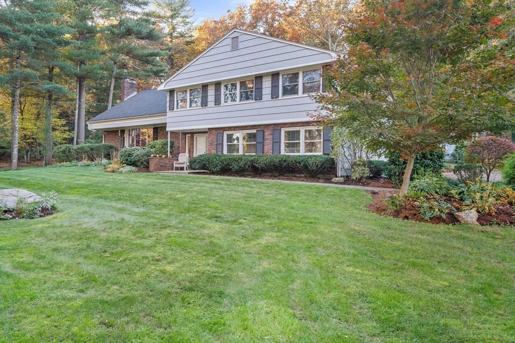 17 Mohawk Road Canton, MA 02021 - Photo 3 of 40 a front view of a house with a yard