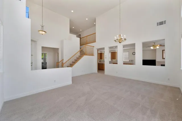 a view of a kitchen with a sink and a window