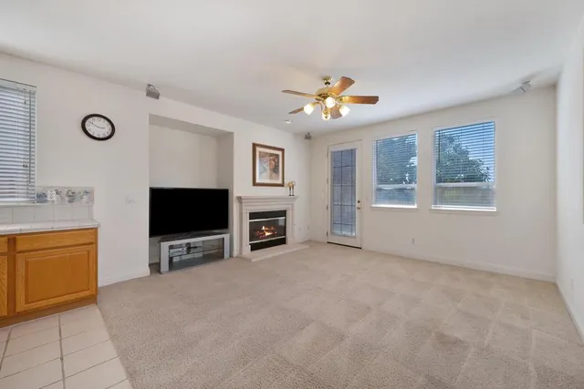 a large kitchen with stainless steel appliances lots of counter top space