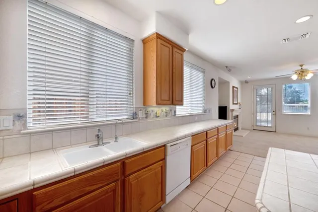 a view of an entryway with furniture and wooden floor