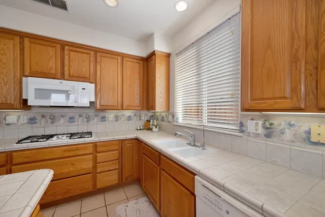 a balcony with wooden floor in outdoor space