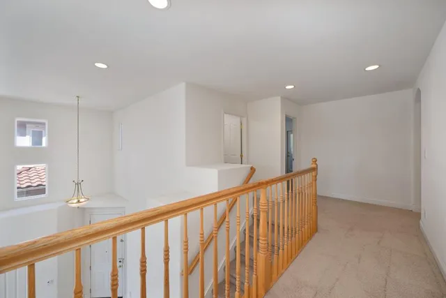 a bathroom with a tub a sink and a shower