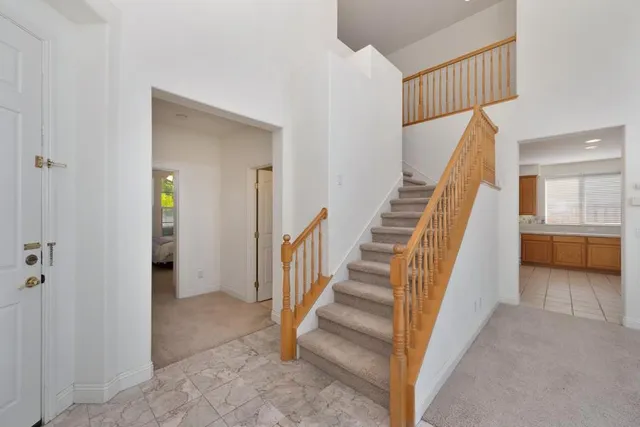 a room with bed and a window