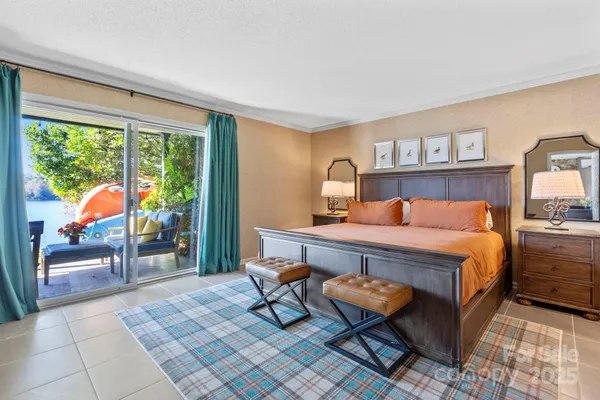 a bed room with a bed and a window