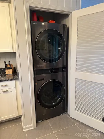 a view of a street with large trees