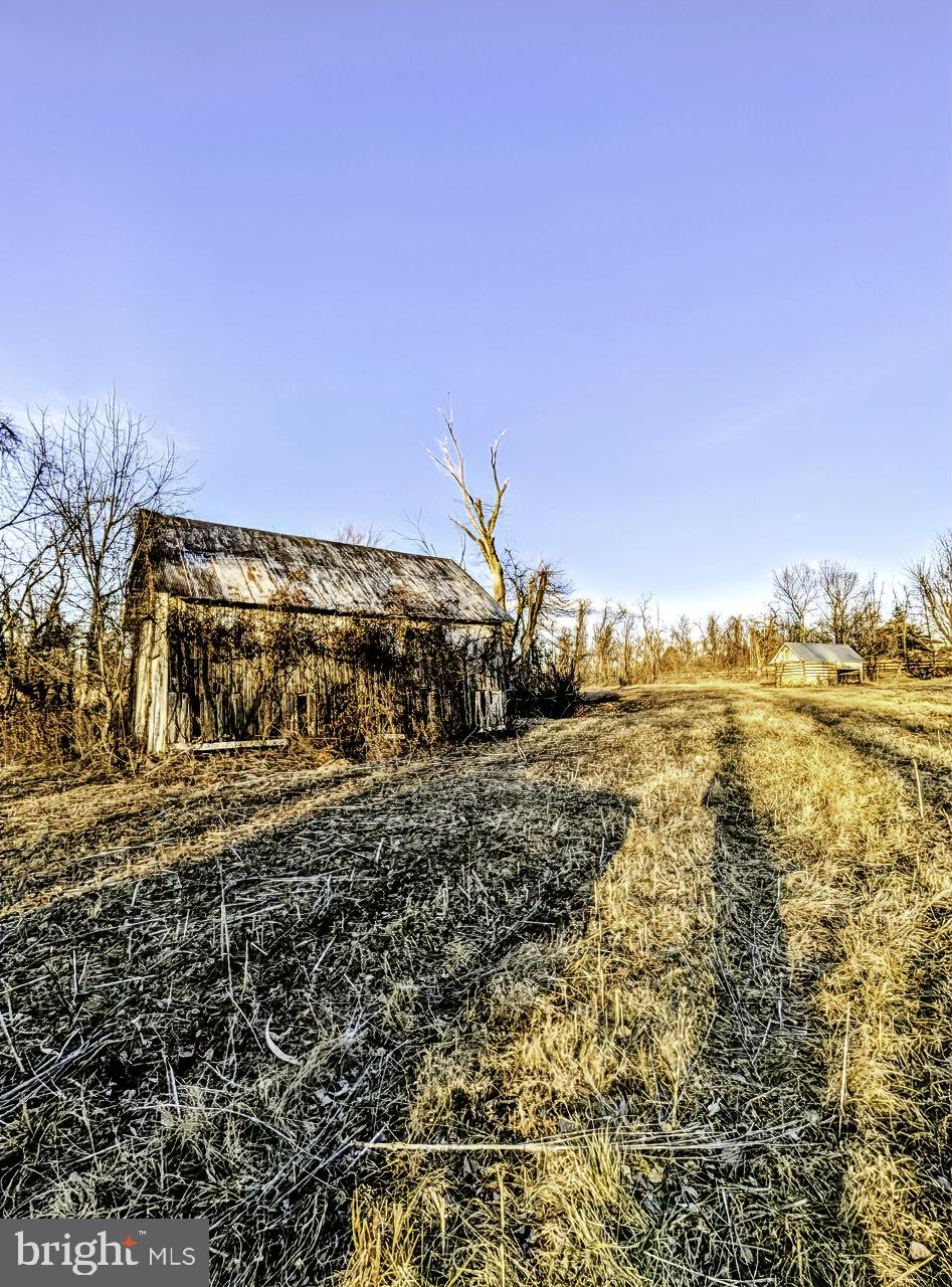 40455 Quarter Branch Road Lovettsville, VA 20180 - Photo 17 of 21 a view of a yard with wooden fence