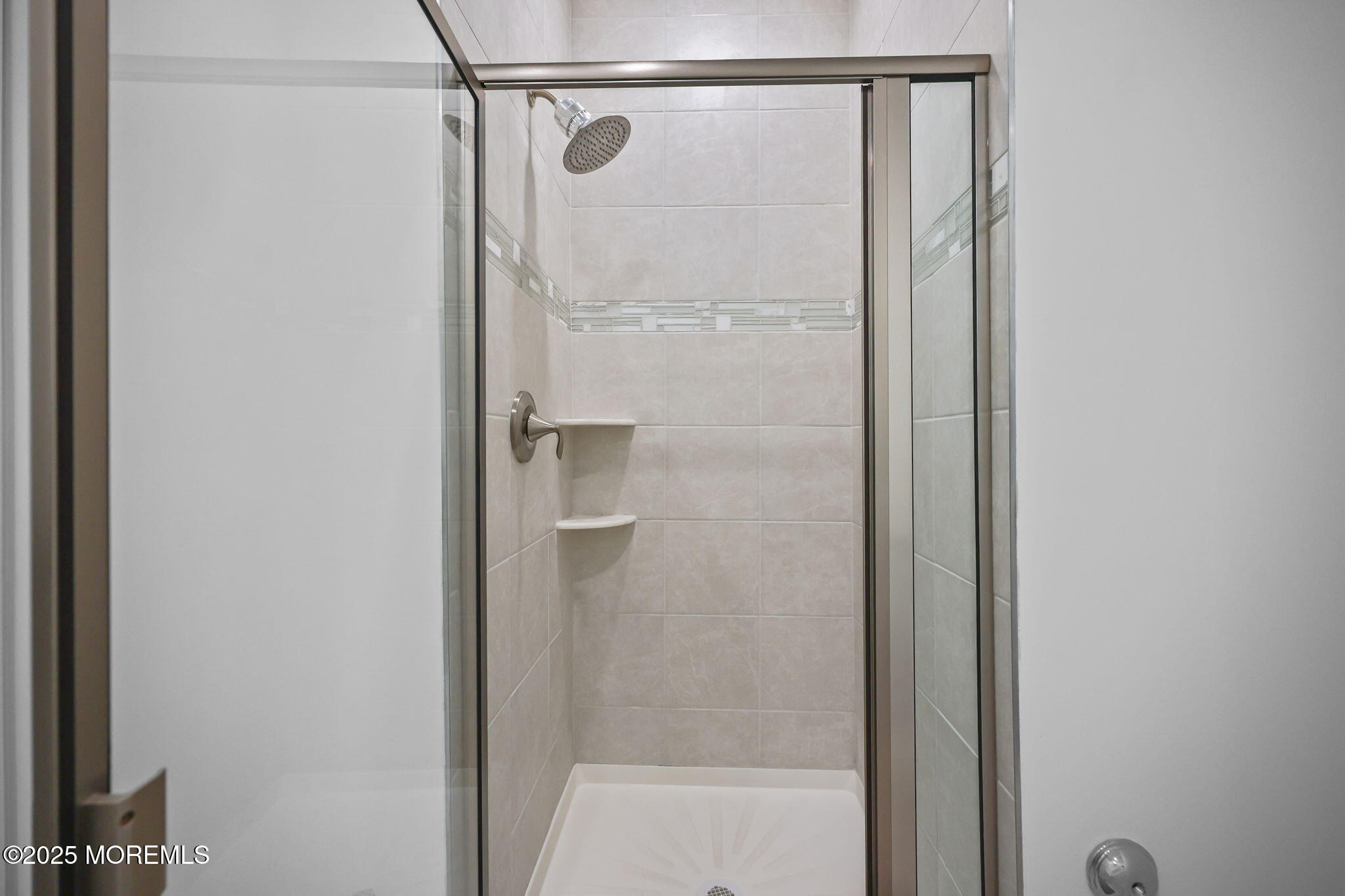 43 Midway Road North Tinton Falls, NJ 07724 - Photo 14 of 20 a bathroom with a glass shower door