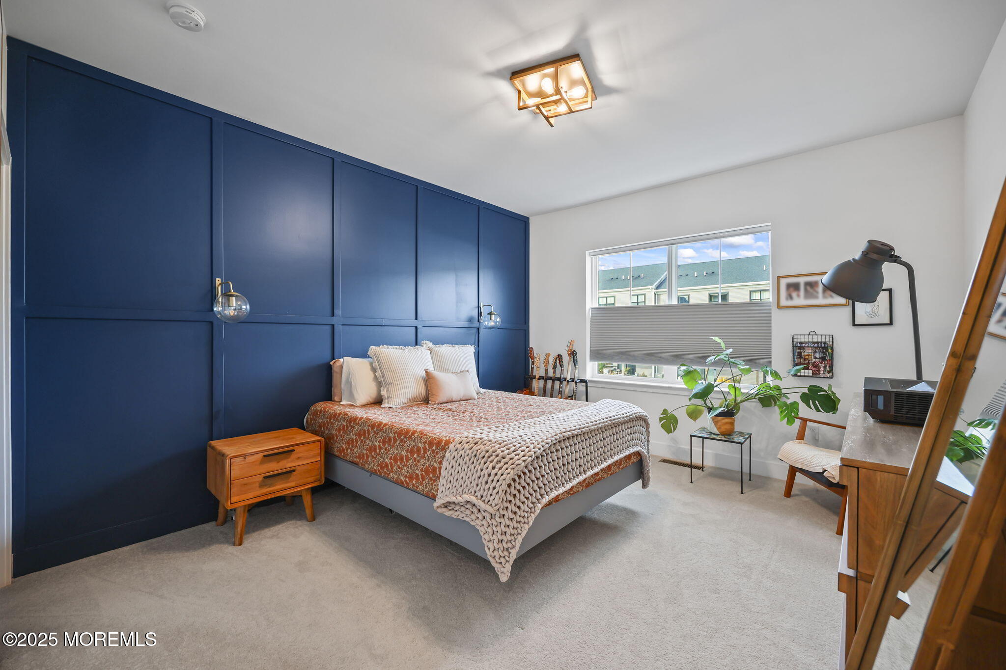 43 Midway Road North Tinton Falls, NJ 07724 - Photo 15 of 20 a bedroom with a bed and a table in it