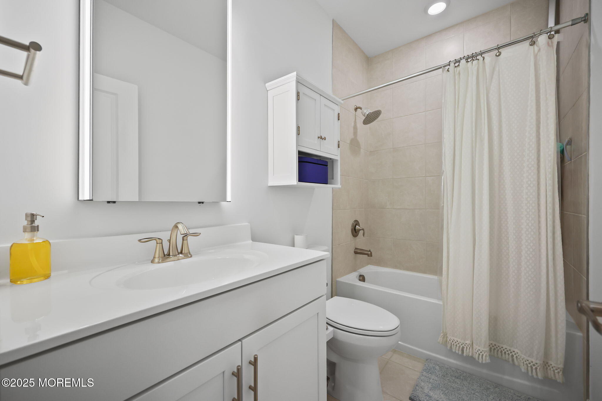 43 Midway Road North Tinton Falls, NJ 07724 - Photo 16 of 20 a bathroom with a sink toilet and shower