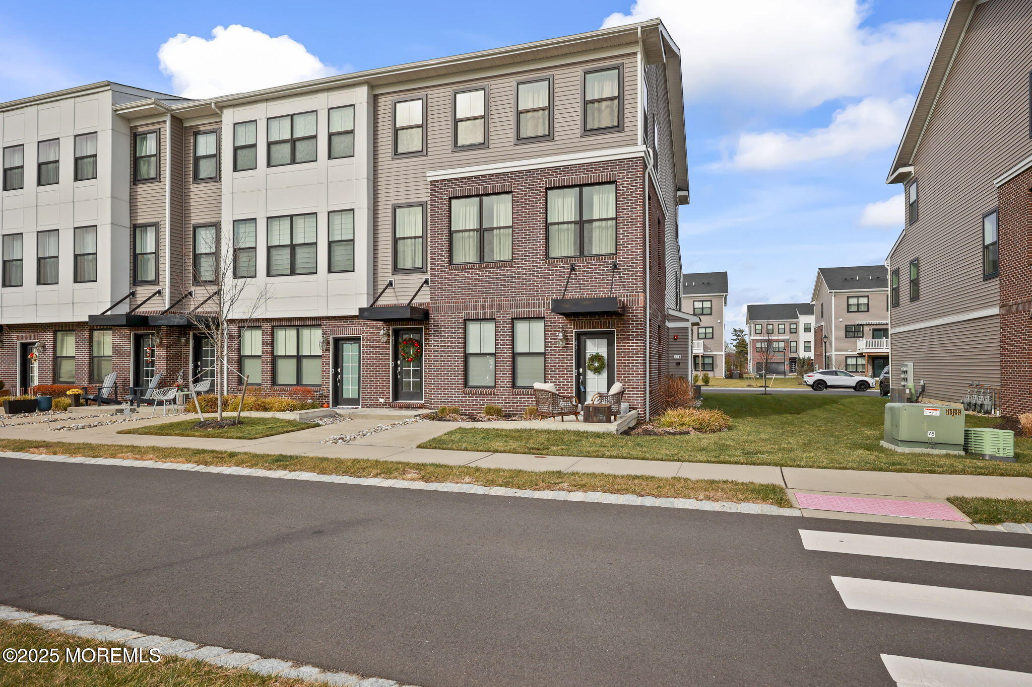 43 Midway Road North Tinton Falls, NJ 07724 - Photo 2 of 20 a view of a building with a yard