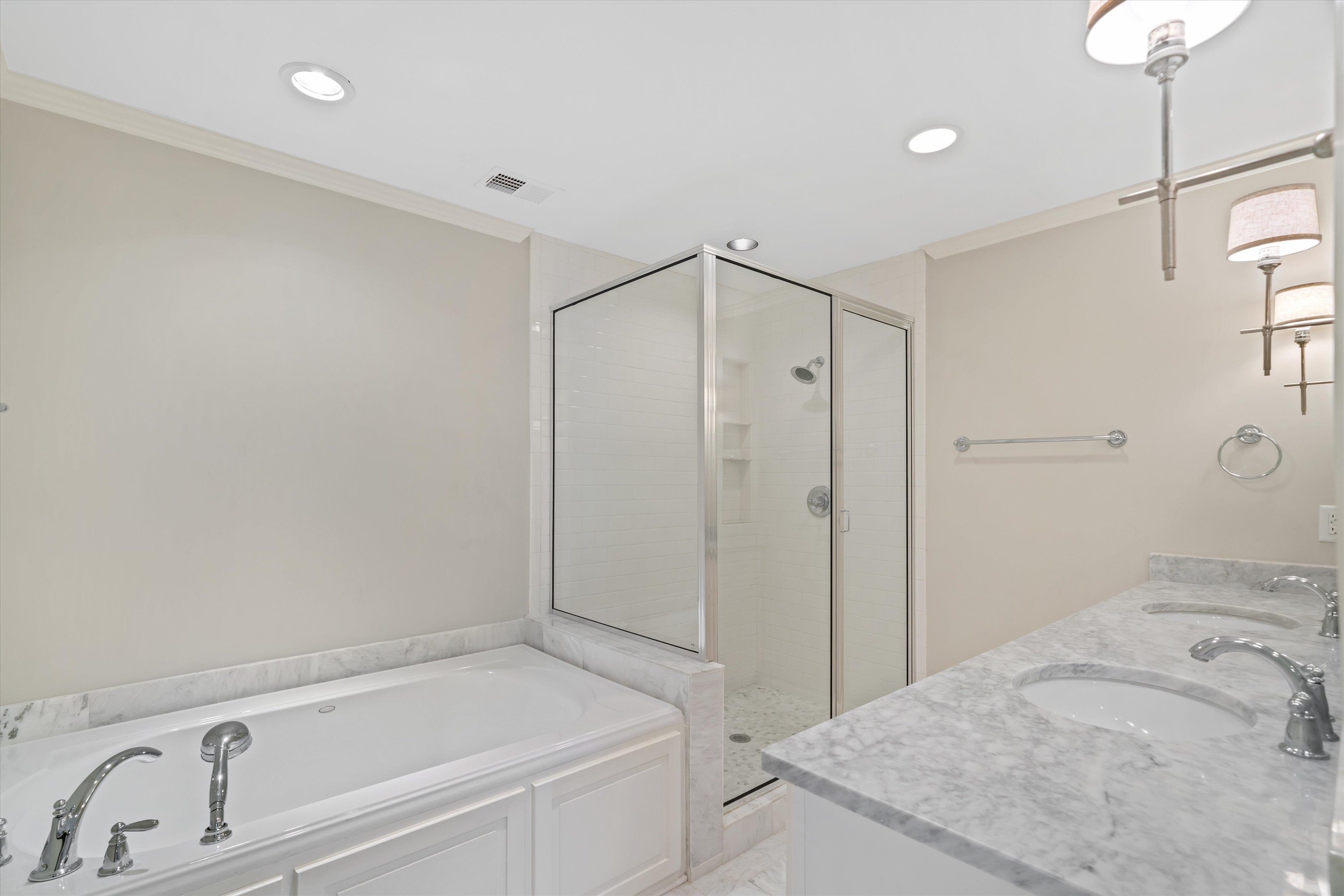317 Pidgeon Road Memphis, TN 38117 - Photo 13 of 25 a bathroom with a bathtub and a shower