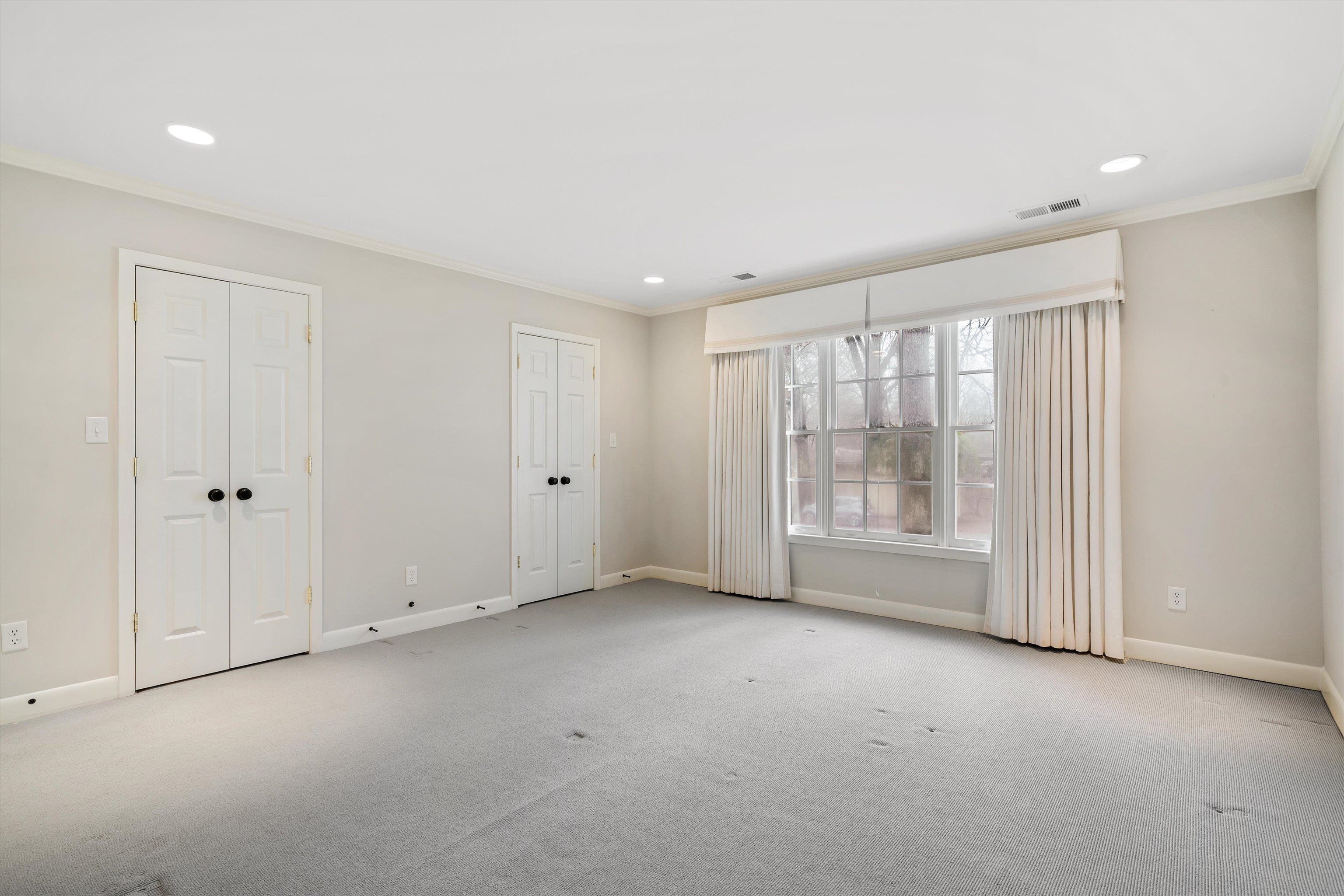 317 Pidgeon Road Memphis, TN 38117 - Photo 15 of 25 a view of an empty room with a window