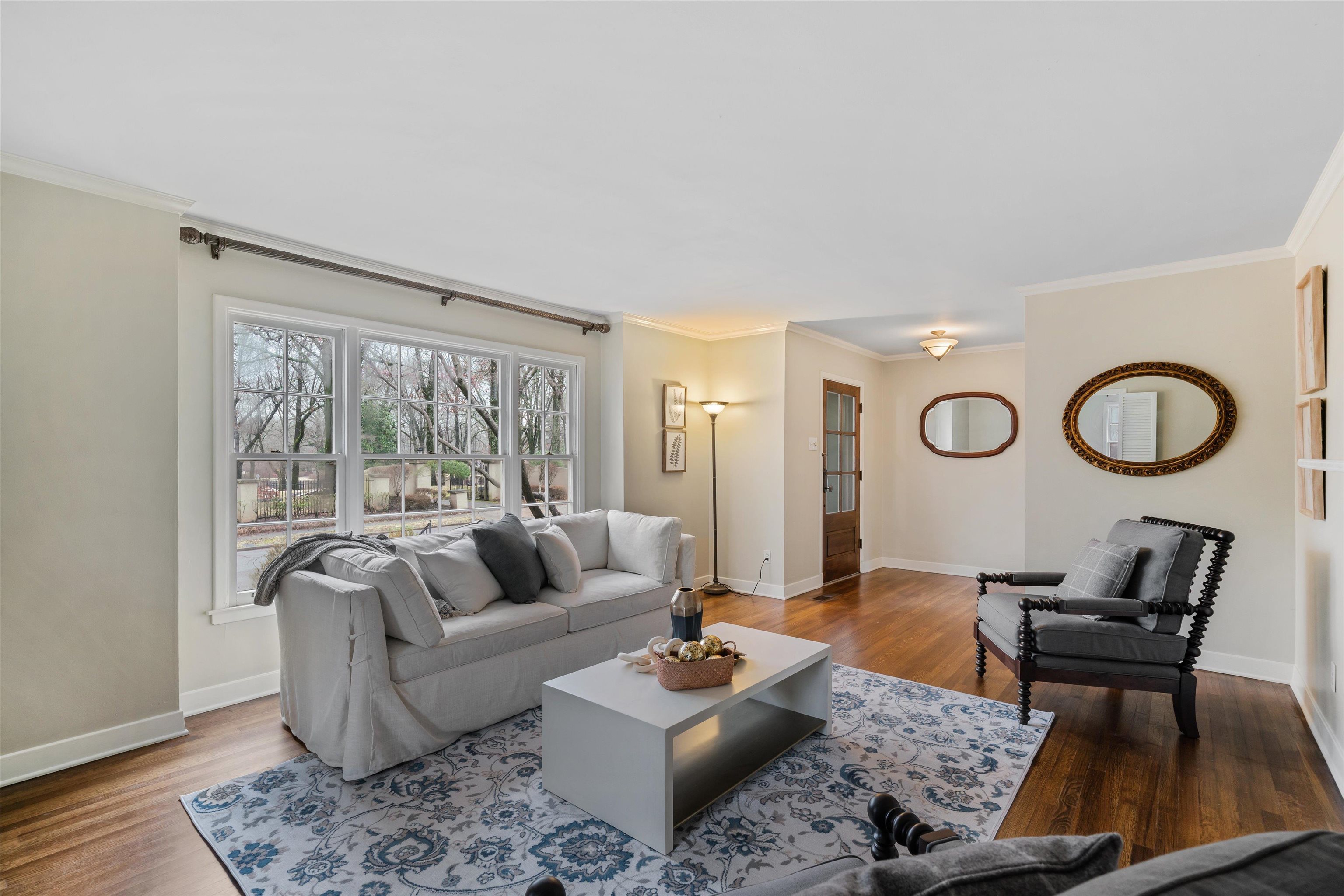 317 Pidgeon Road Memphis, TN 38117 - Photo 3 of 25 a living room with furniture and a large window