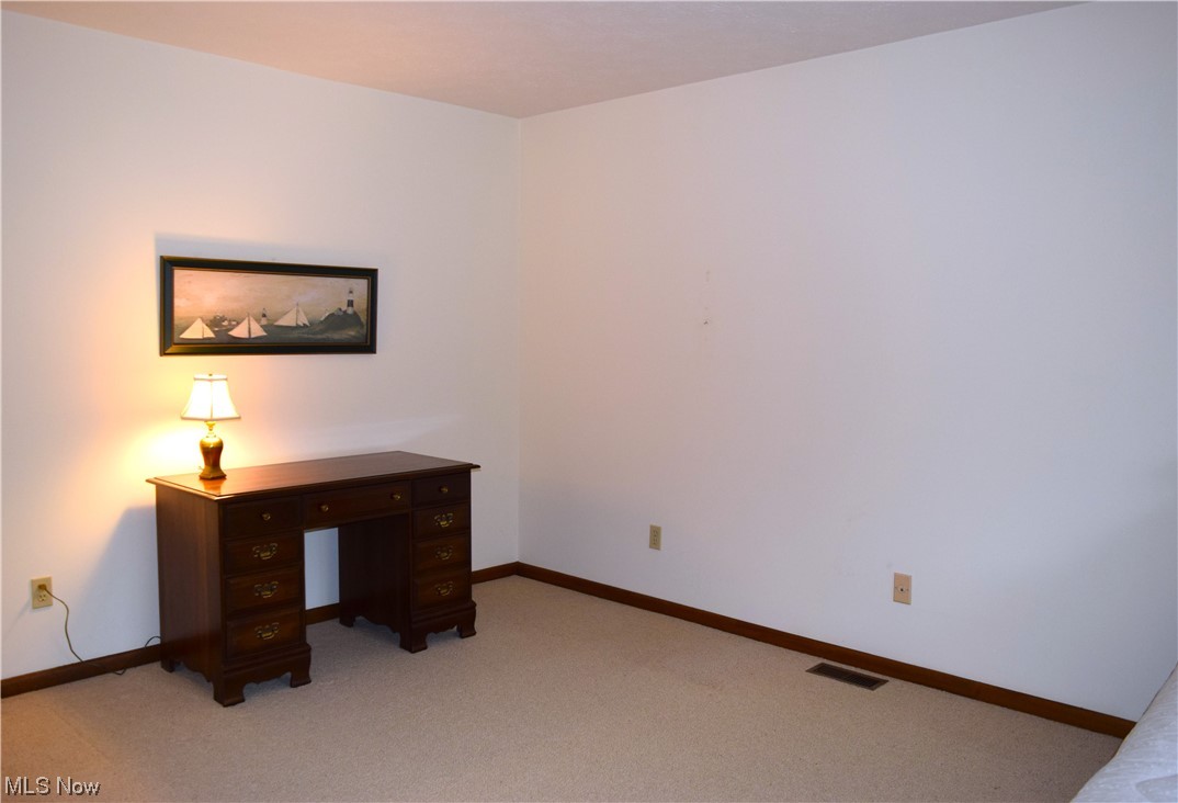 22522 Center Ridge Road, Unit E Rocky River, OH 44116 - Photo 19 of 22 opposite side of the bedroom that could be used as a sitting area or Office