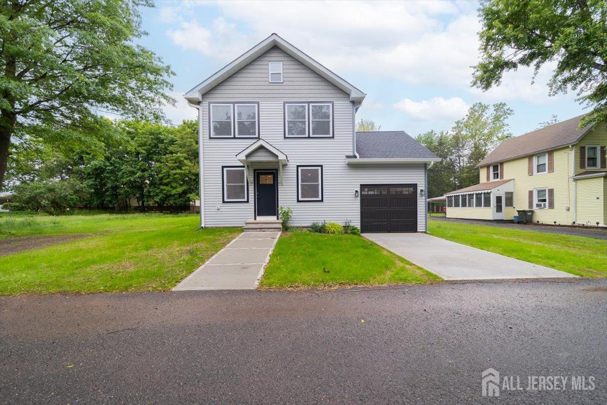 17 4th Street Hillsborough, NJ 08821 - Photo 1 of 33 a front view of house with yard and green space