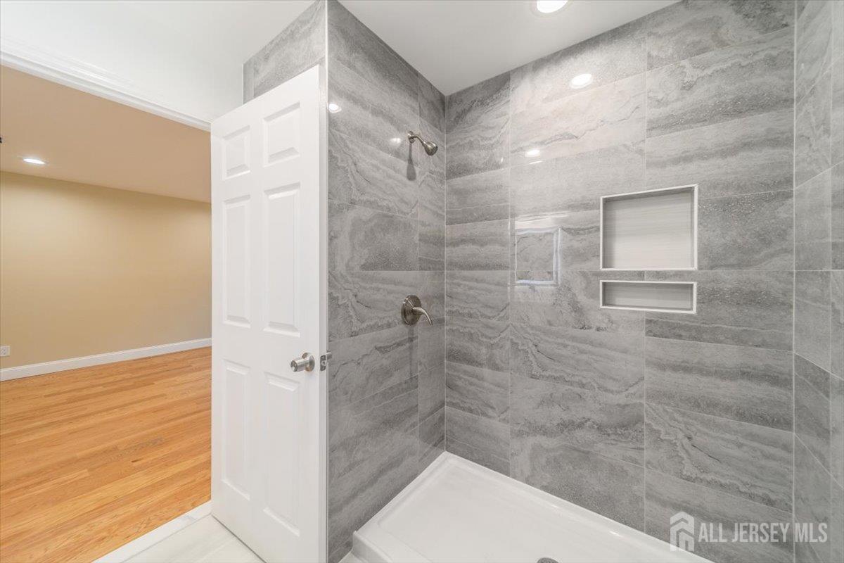 17 4th Street Hillsborough, NJ 08821 - Photo 16 of 33 a bathroom with a shower