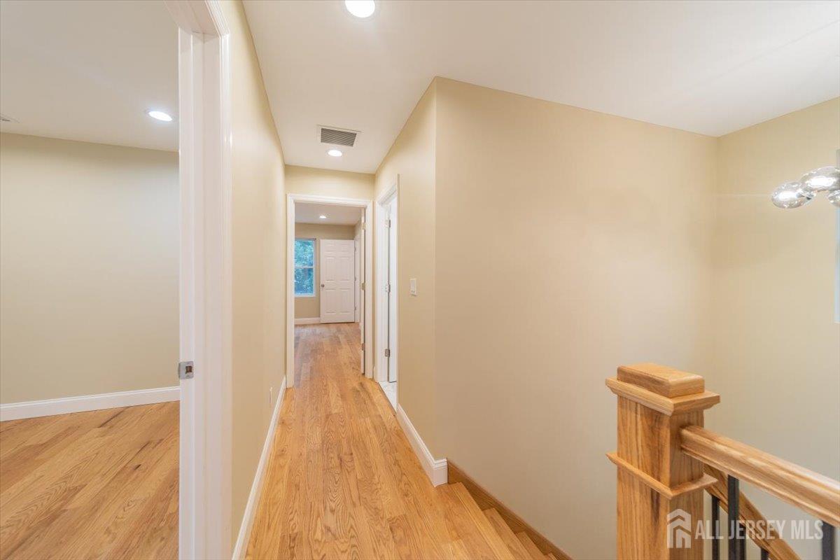 17 4th Street Hillsborough, NJ 08821 - Photo 26 of 33 a view of a hallway with wooden floor