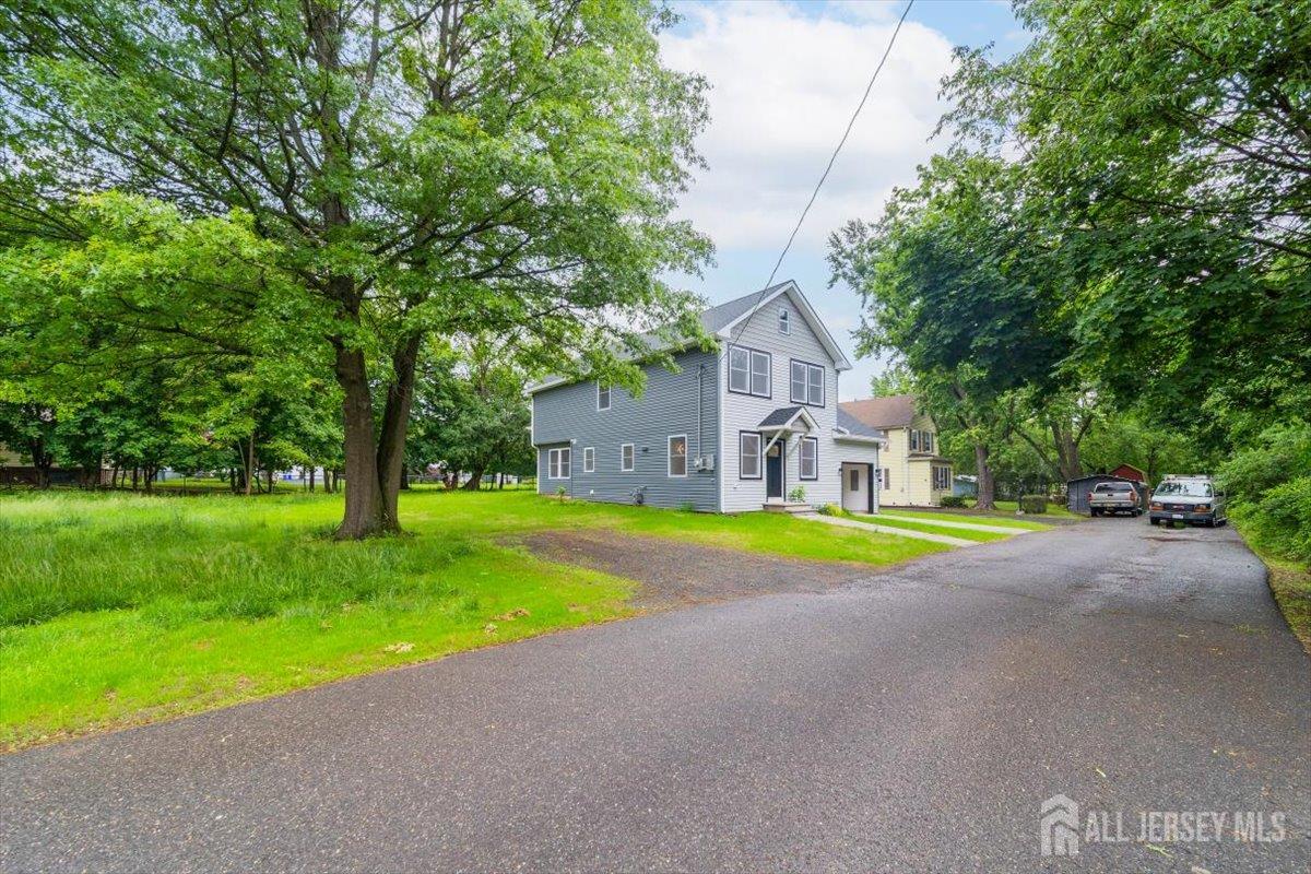 17 4th Street Hillsborough, NJ 08821 - Photo 33 of 33 a view of a house with pool and a yard