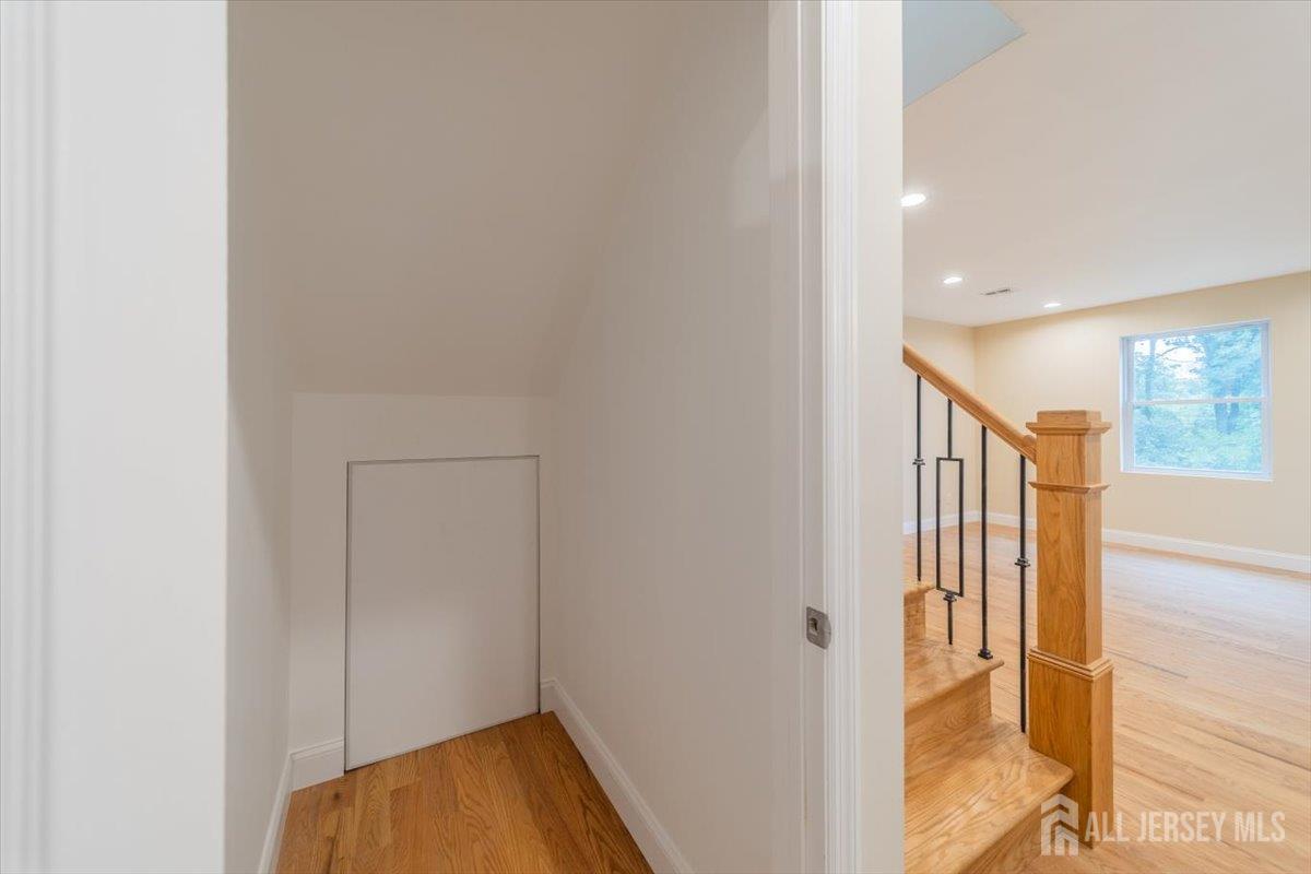 17 4th Street Hillsborough, NJ 08821 - Photo 10 of 33 a view of hallway with wooden floor