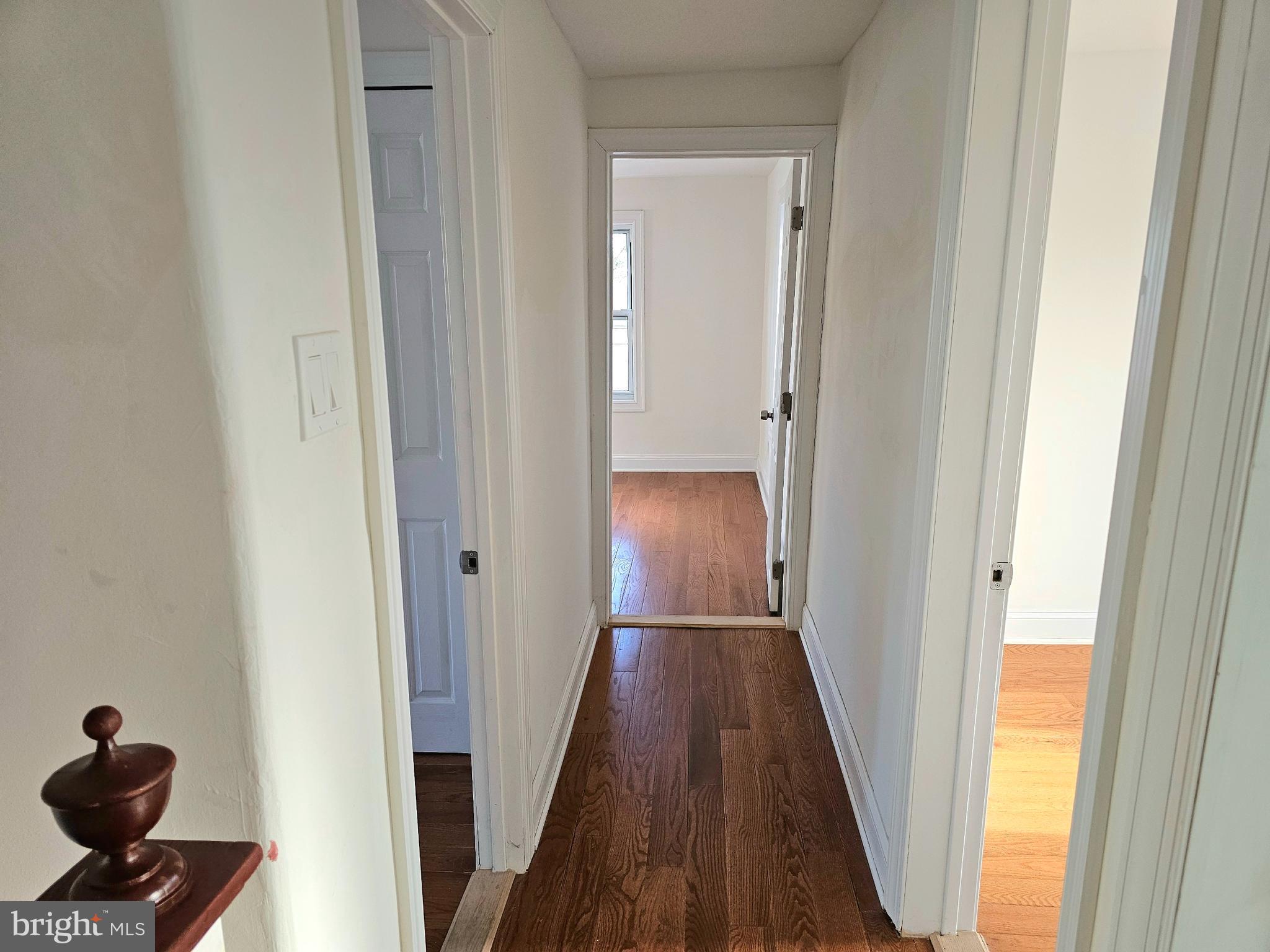 332 East Linden Avenue Lindenwold, NJ 08021 - Photo 19 of 25 a view of a hallway with wooden floor and closet