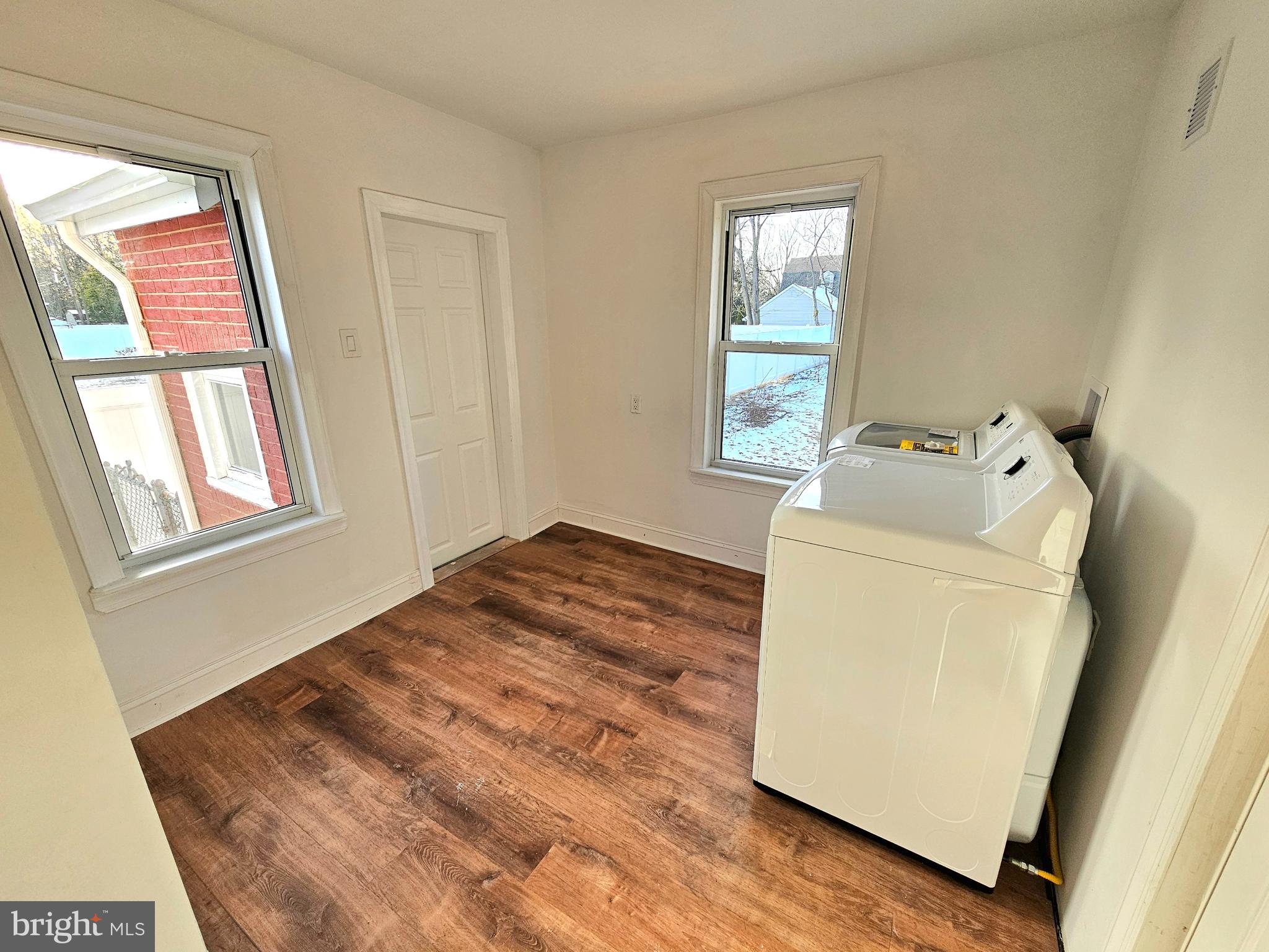 332 East Linden Avenue Lindenwold, NJ 08021 - Photo 20 of 25 a room with a bed and wooden floor