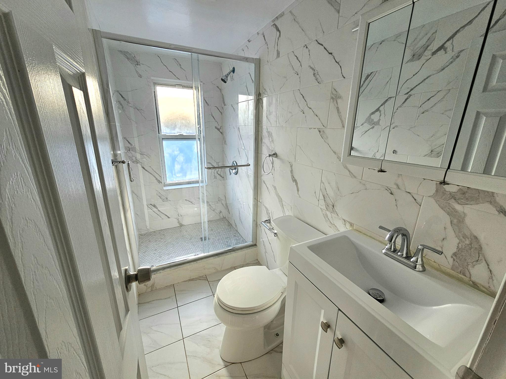 332 East Linden Avenue Lindenwold, NJ 08021 - Photo 4 of 25 a bathroom with a sink toilet and shower